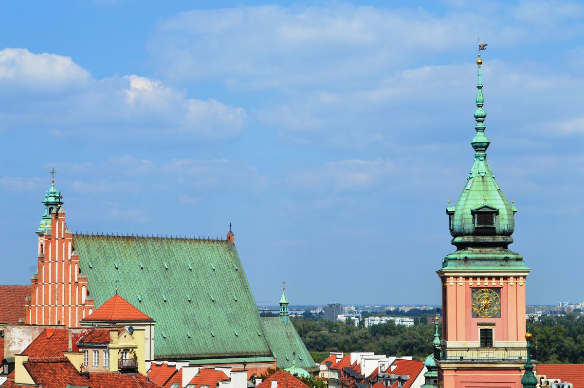Warsaw Royal Castle tower and St John's Cathedral skyline view on a clear day
